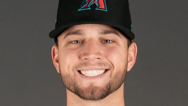 Slade Cecconi smiles for a photo on picture day at Salt River Fields